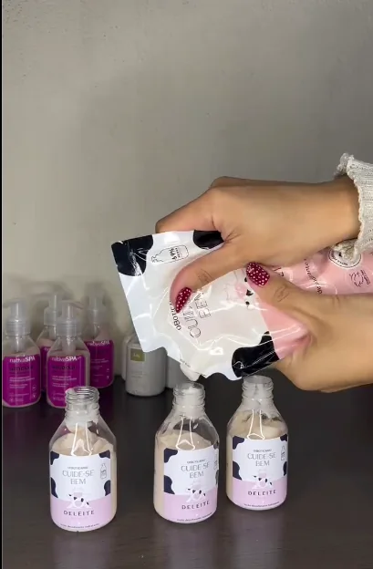Aplicação dos rótulos em frascos de creme